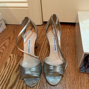 Manolo Blahnik gold pumps